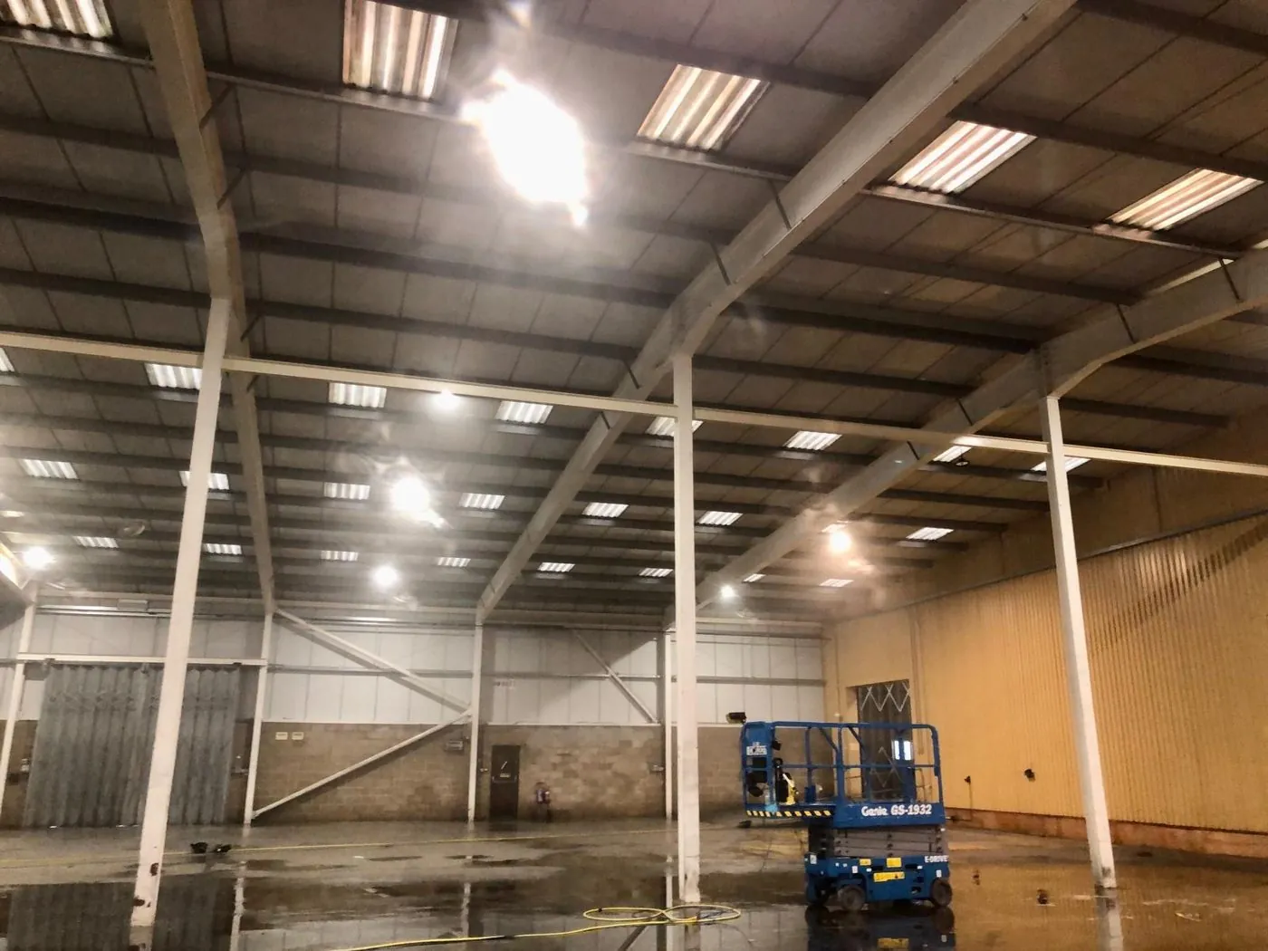 Warehouse high-level clean using access equipment